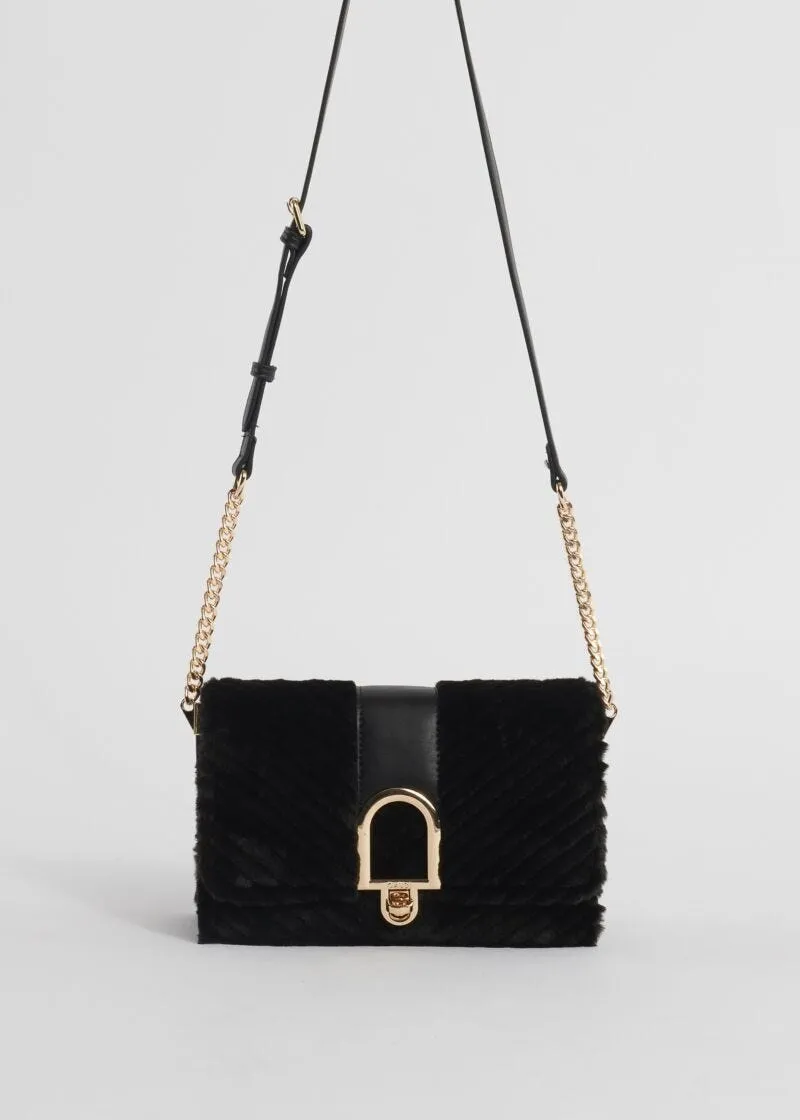 Borsa crossbody in pelliccia sintetica