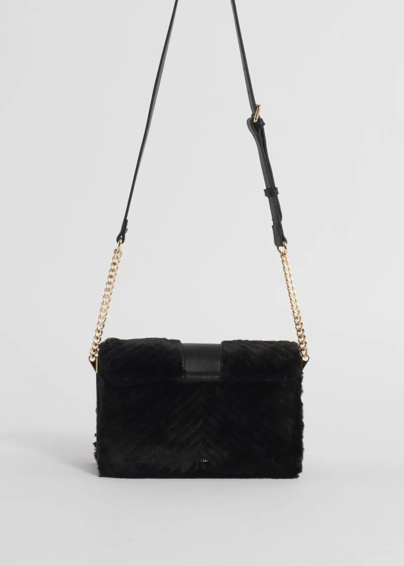 Borsa crossbody in pelliccia sintetica