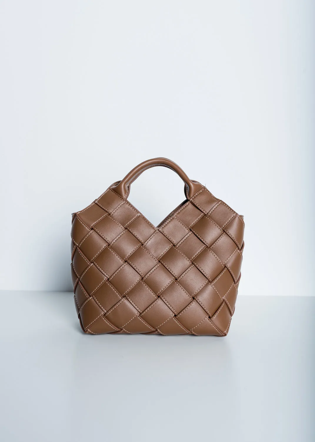 Borsa effetto pelle intrecciata