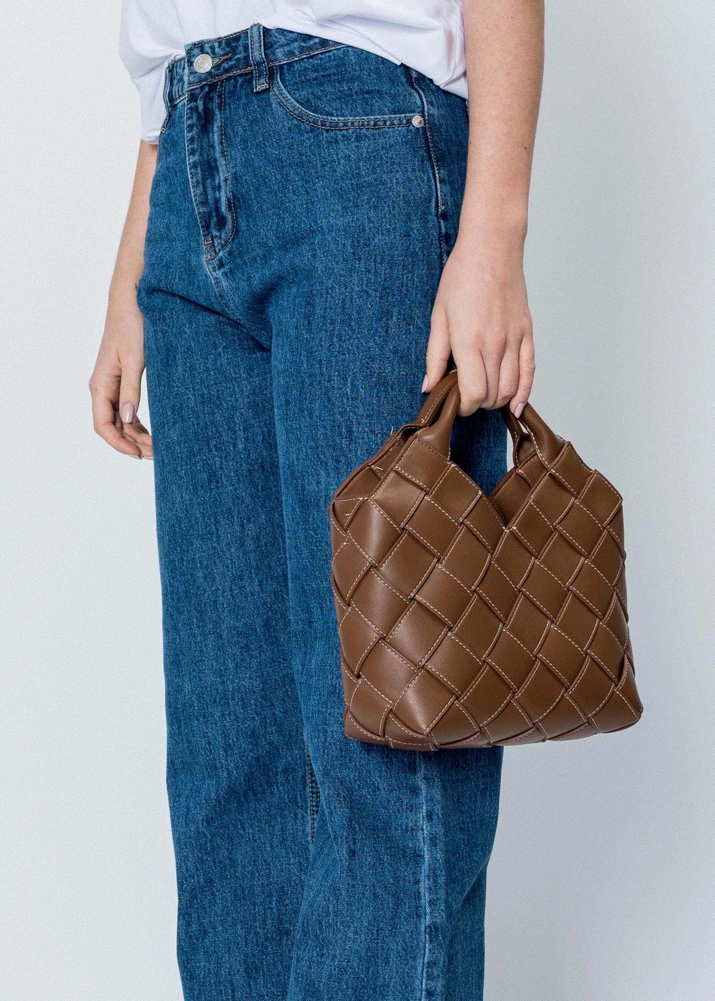 Borsa effetto pelle intrecciata
