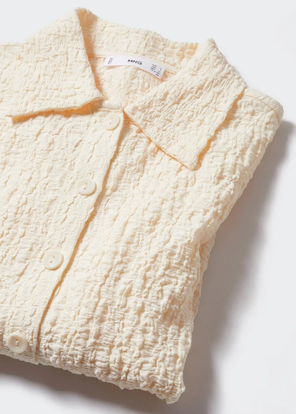 Camicia texture bottoni