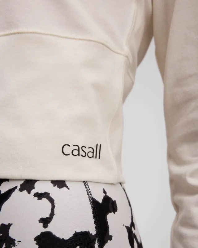 Felpa corta crema da fitness da donna Casall Studio Hoodie