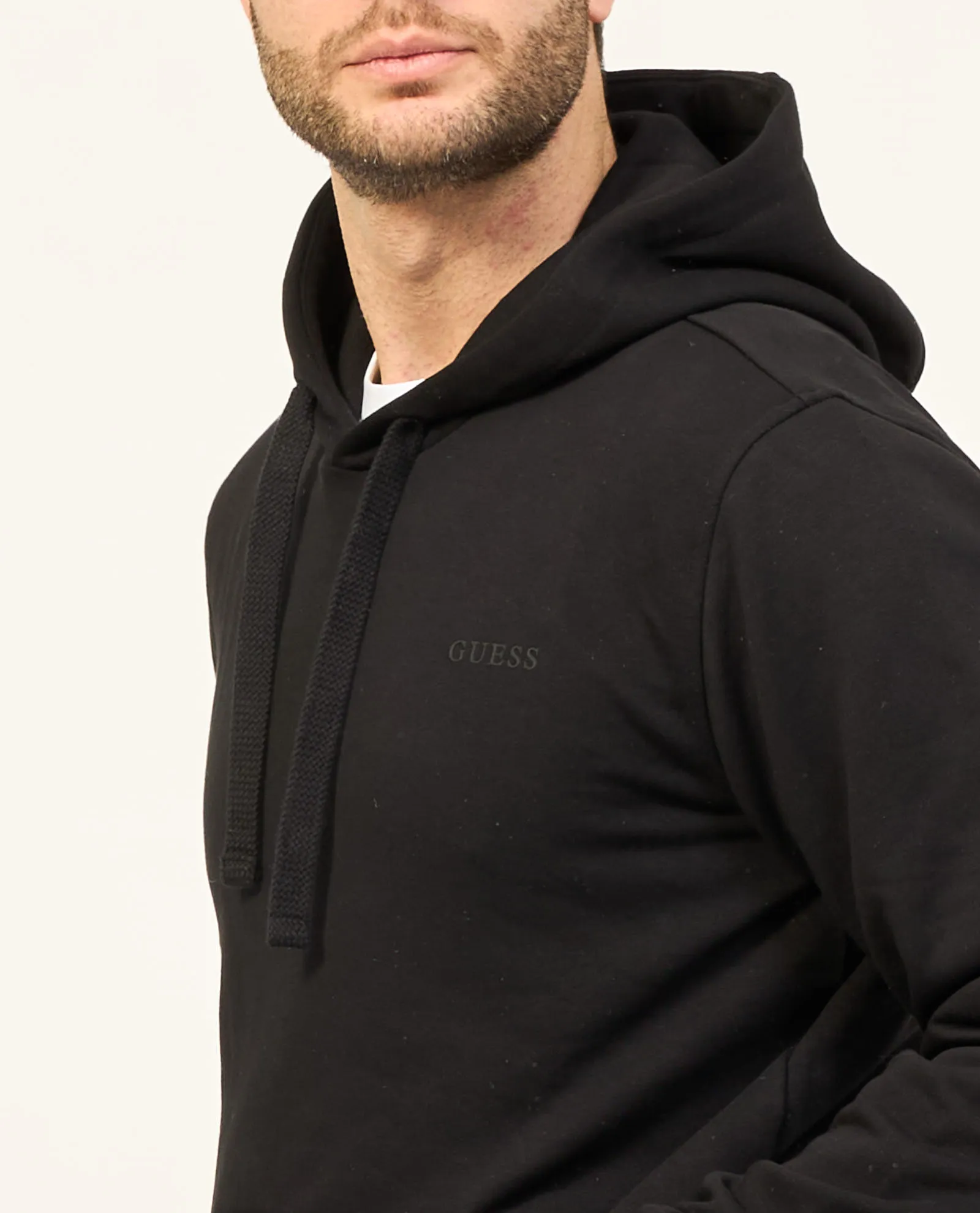 Felpa uomo Guess nera con tasca a marsupio