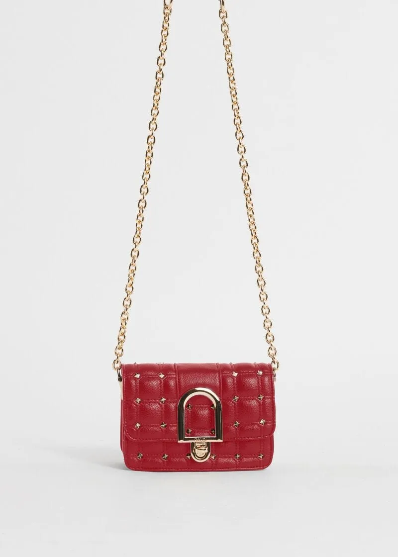 Mini crossbody matelassé con borchie